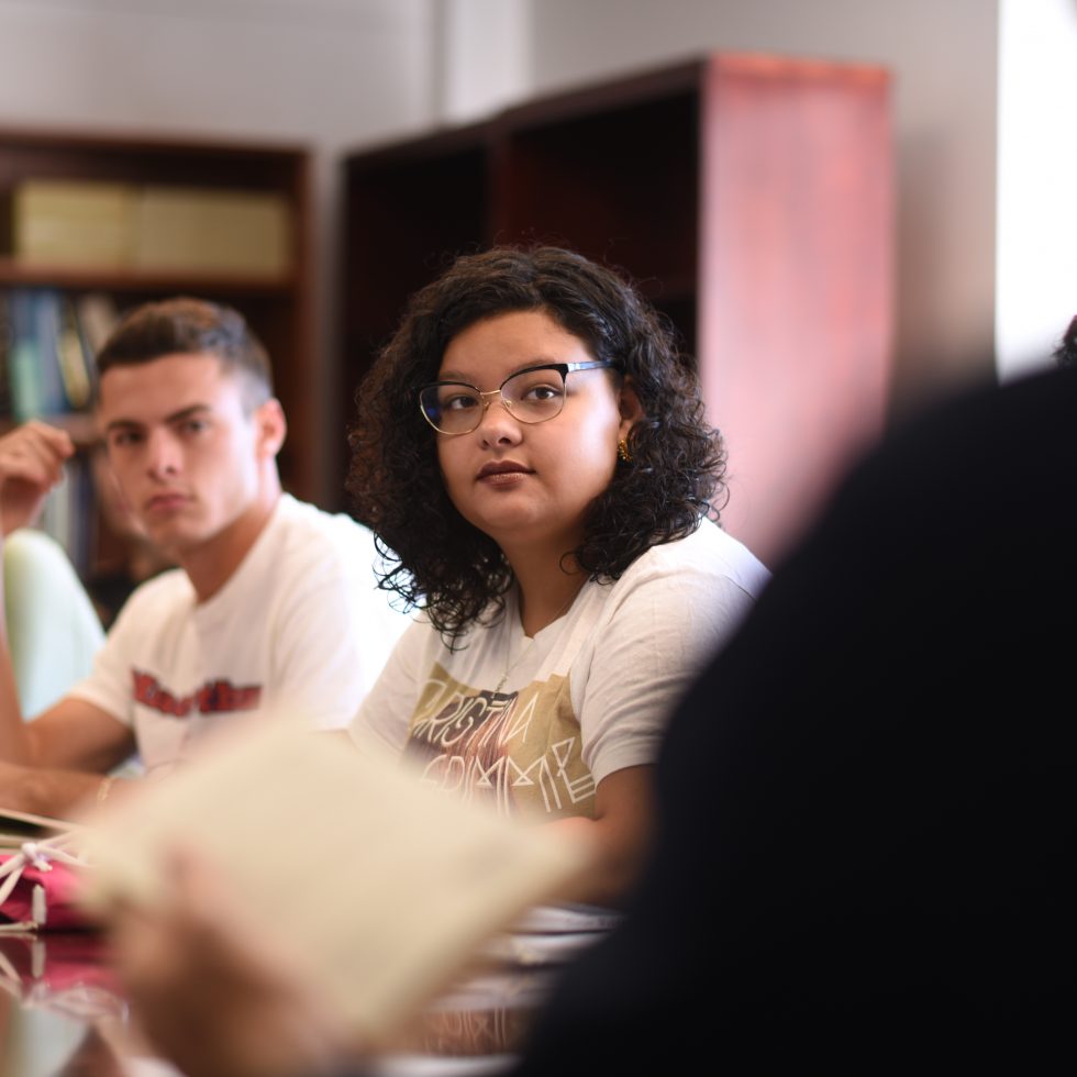 Inside an honors classroom lecture. Small classes with table discussion